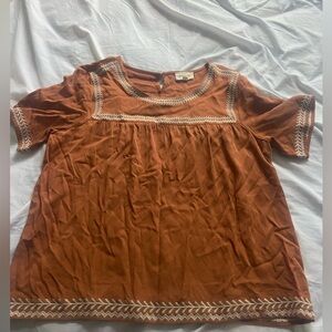 Embroidered burnt orange blouse